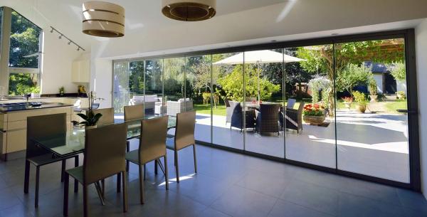 Frameless Stacking Doors in Dubai – Modern, Elegant, and Durable Solutions