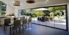 Frameless Stacking Doors in Dubai – Modern, Elegant, and Durable Solutions